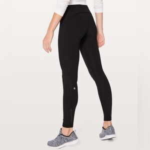 BLACK LULULEMON FAST AS FLEECE TIGHT